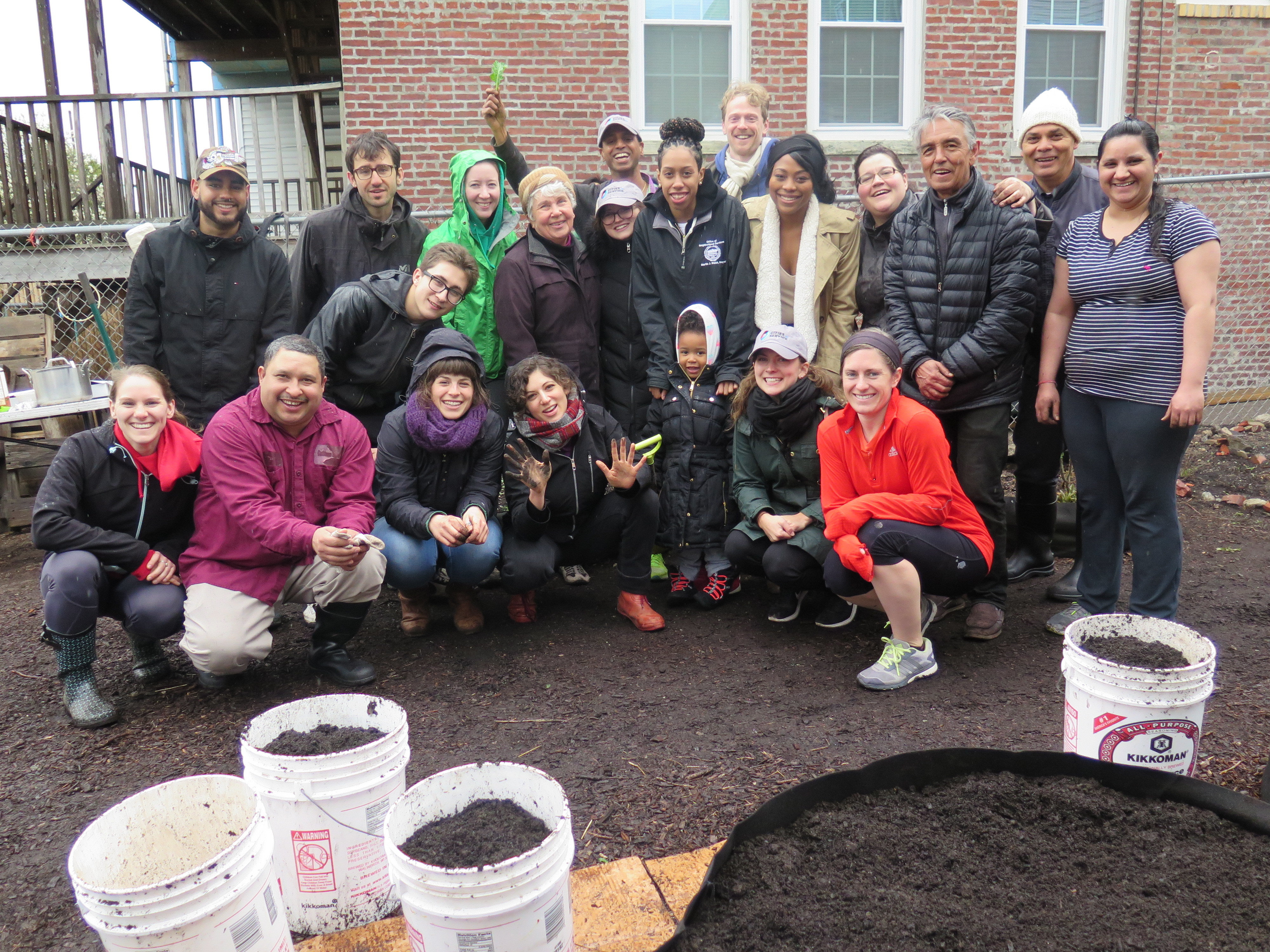 East Boston residents at Eastie Farm participate in an Earth Day work day and kick off the growing season.